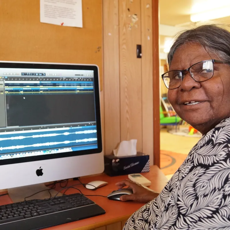 Broadcaster at the studio computer preparing a program